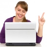 Girl with laptop pointing up